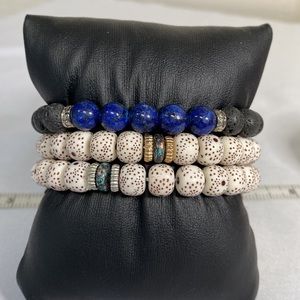 There fun stretch lapis lava rock and molded speckled bead bracelets